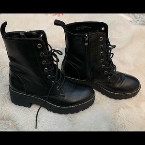 Dirty laundry, combat boots, black faux leather